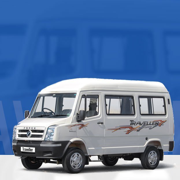 Street scene with person walking and others on motorbikes, all wearing masks